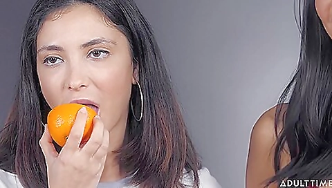 Two black lesbians lick each other